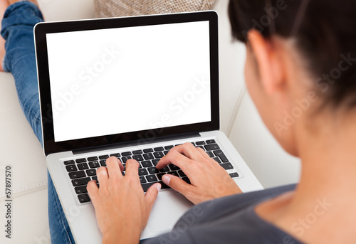 Photo: Woman With Laptop Woman With Laptop