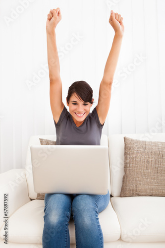 Photo: Young Woman With Laptop Young Woman With Laptop