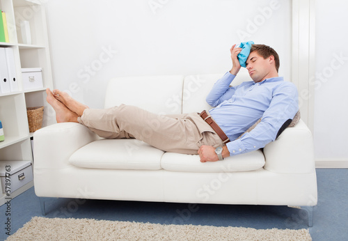Photo: Man Suffering With Headache Man Suffering With Headache