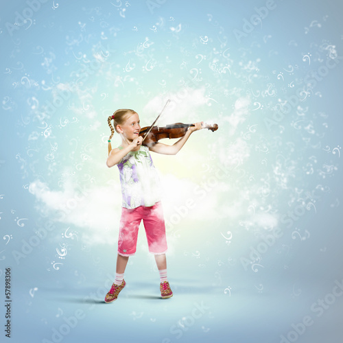 Photo: Girl playing violin Girl playing violin