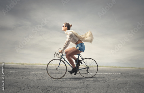 Photo: woman on bike woman on bike