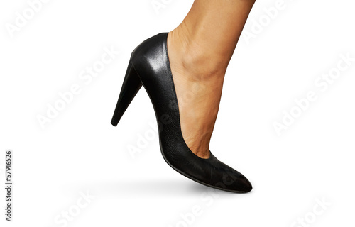 Photo: female leg and high heel shoe female leg and high heel shoe
