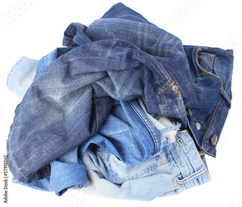 Photo: Set of jeans isolated on white background Set of jeans isolated on white background