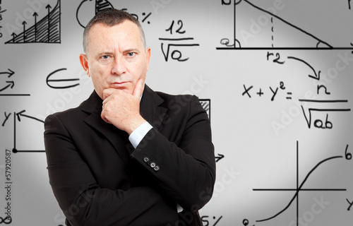Photo: People writing formulas People writing formulas