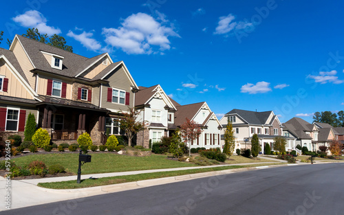 Photo: Street of large suburban homes Street of large suburban homes