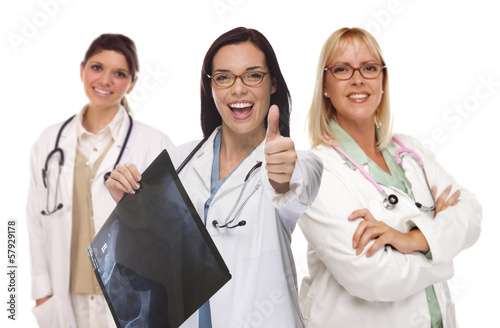 Photo: Three Female Doctors or Nurses with Thumbs Up Holding X-ray Three Female Doctors or Nurses with Thumbs Up Holding X-ray