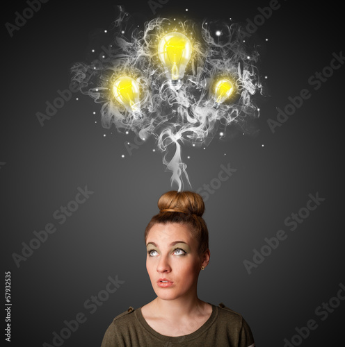 Photo: Thoughtful woman with smoke and lightbulbs above her head Thoughtful woman with smoke and lightbulbs above her head