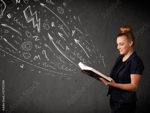 Photo: Young woman reading a book Young woman reading a book