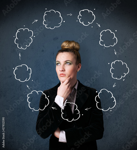 Photo: Young woman thinking with cloud circulation around her head Young woman thinking with cloud circulation around her head