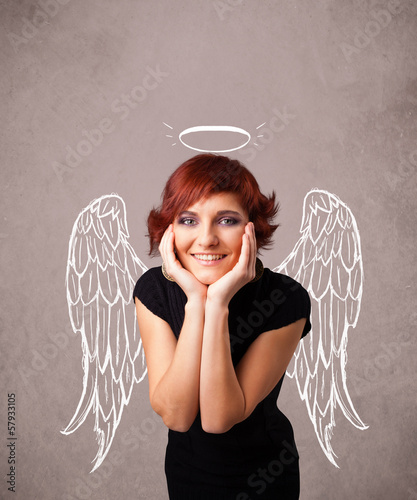 Photo: Cute girl with angel illustrated wings Cute girl with angel illustrated wings