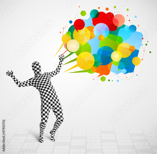 Photo: Strange guy in morphsuit looking at colorful speech bubbles Strange guy in morphsuit looking at colorful speech bubbles