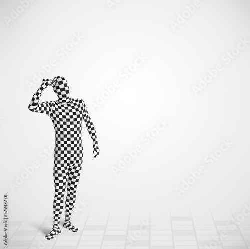 Photo: Funny guy in morphsuit body suit looking at copy space Funny guy in morphsuit body suit looking at copy space
