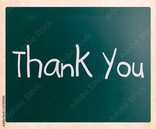 Illustration: "Thank you" handwritten with white chalk on a blackboard "Thank you" handwritten with white chalk on a blackboard