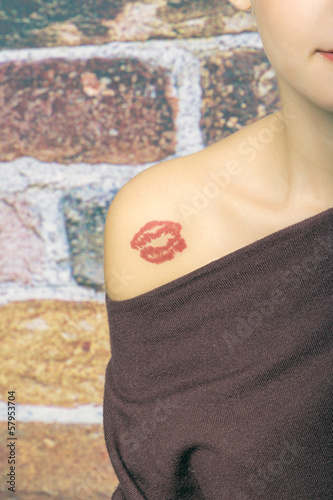 Photo: Girl with tattoo on her shoulder color image Girl with tattoo on her shoulder color image