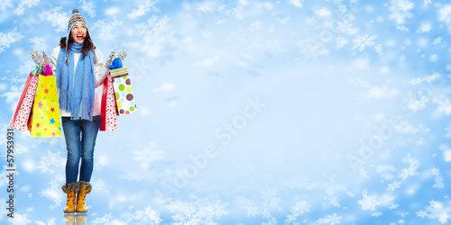 Photo: Girl with shopping bags. Christmas sale. Girl with shopping bags. Christmas sale.