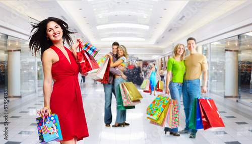 Photo: Beautiful Girl with shopping bags. Beautiful Girl with shopping bags.