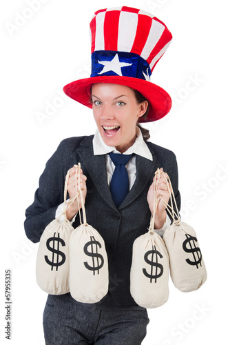Photo: Businesswoman with sacks of money on white Businesswoman with sacks of money on white