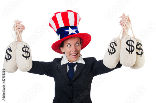 Photo: Businesswoman with sacks of money on white Businesswoman with sacks of money on white