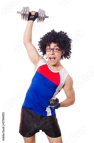 Photo: Funny man exercising with dumbbells Funny man exercising with dumbbells
