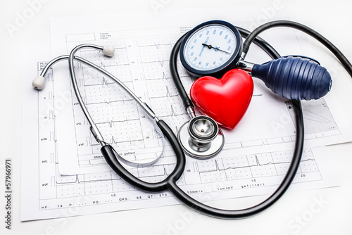 Photo: Medical tools lying on ECG Medical tools lying on ECG