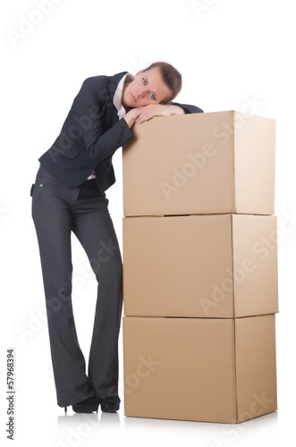 Photo: Woman businesswoman with boxes on white Woman businesswoman with boxes on white