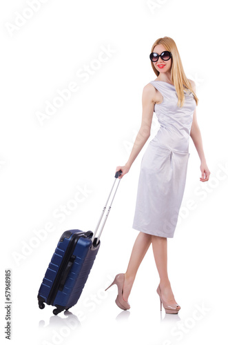 Photo: Woman preparing for vacation with suitcase on white Woman preparing for vacation with suitcase on white