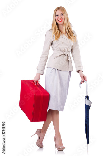Photo: Woman preparing for vacation with suitcase on white Woman preparing for vacation with suitcase on white