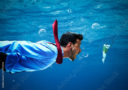 Photo: Businessman taking the bait Businessman taking the bait