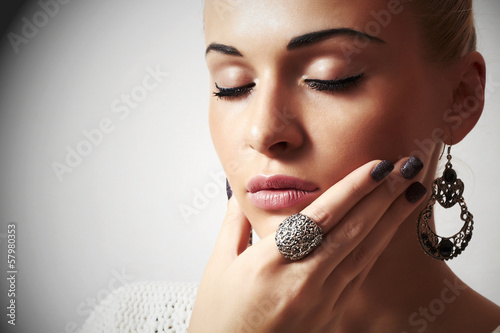 Photo: Beautiful woman.Jewelry and Beauty.liquid sand manicure Beautiful woman.Jewelry and Beauty.liquid sand manicure