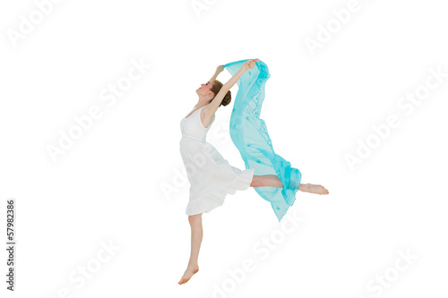 Photo: Young beautiful female dancer with blue scarf Young beautiful female dancer with blue scarf