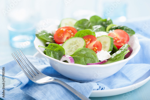 Photo: salad with tomatoes cucumber and goat cheese salad with tomatoes cucumber and goat cheese