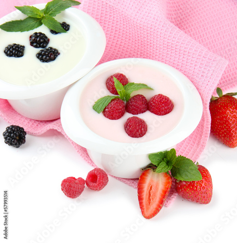 Photo: Delicious yogurt with berries isolated on white Delicious yogurt with berries isolated on white