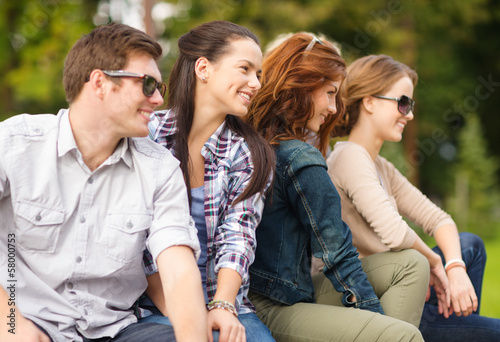 Photo: group of students or teenagers hanging out group of students or teenagers hanging out