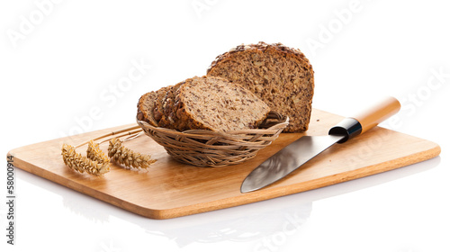 Photo: whole grain bread isolated on white background. whole grain bread isolated on white background.