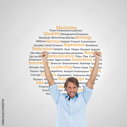 Photo: Composite image of happy man celebrating success with arms up Composite image of happy man celebrating success with arms up