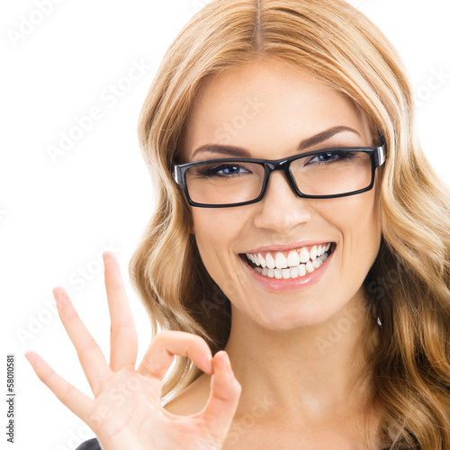 Photo: Businesswoman with okay gesture, isolated Businesswoman with okay gesture, isolated