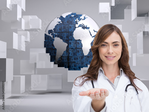 Photo: Composite image of portrait of female nurse holding out open pal Composite image of portrait of female nurse holding out open pal