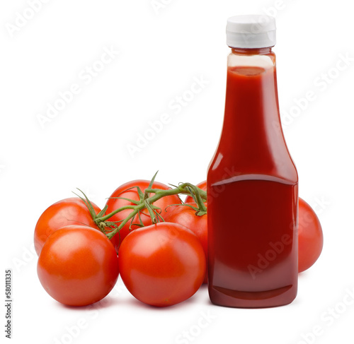 Photo: Ketchup bottle and fresh tomatoes Ketchup bottle and fresh tomatoes