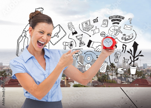 Photo: Composite image of businesswoman indicating alarm clock Composite image of businesswoman indicating alarm clock
