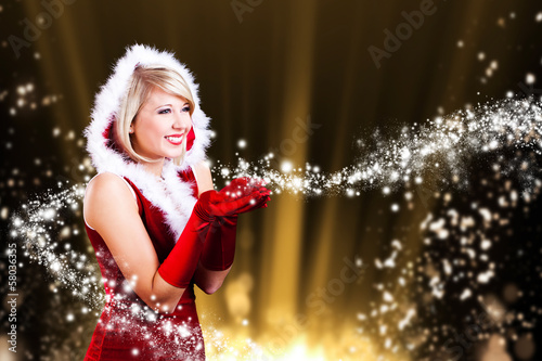 Photo: Weihnachtsfrau mit Sternchenstaub Weihnachtsfrau mit Sternchenstaub