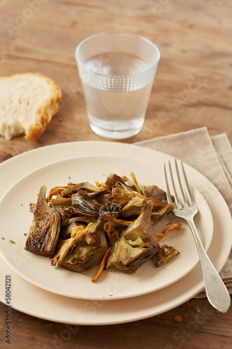 Photo: Dish of sauteed artichokes and yellow foot mushrooms Dish of sauteed artichokes and yellow foot mushrooms