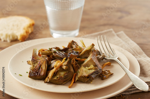 Photo: Dish of sauteed artichokes and yellow foot mushrooms Dish of sauteed artichokes and yellow foot mushrooms