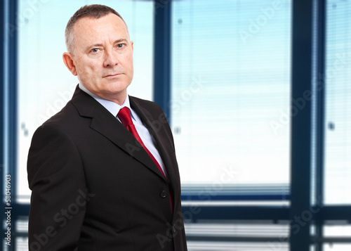 Photo: Confident businessman in the office Confident businessman in the office