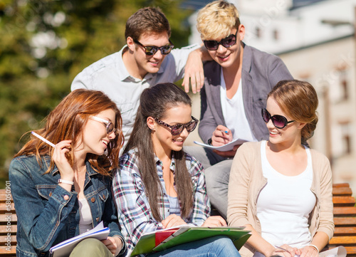 Photo: group of students or teenagers hanging out group of students or teenagers hanging out