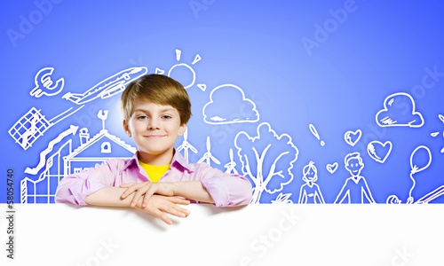Photo: Cute boy with banner Cute boy with banner