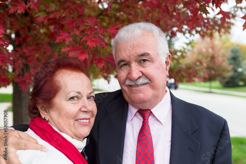 Photo: Senior Couple Portrait Under the Autumn Tree Senior Couple Portrait Under the Autumn Tree
