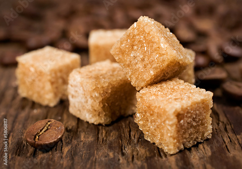 Photo: brown cane sugar with coffee beans brown cane sugar with coffee beans
