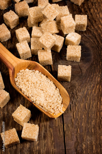 Photo: brown cane sugar cubes and granules brown cane sugar cubes and granules