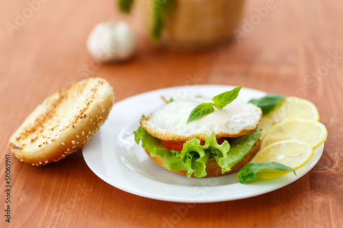 Photo: sandwich with egg and vegetables sandwich with egg and vegetables
