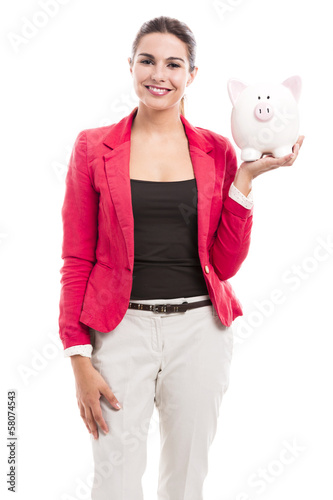 Photo: Business woman with a piggy bank Business woman with a piggy bank